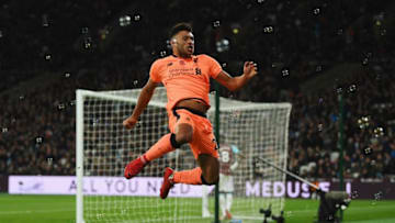 LONDON, ENGLAND - NOVEMBER 04: Alex Oxlade-Chamberlain of Liverpool celebrates scoring his sides third goal during the Premier League match between West Ham United and Liverpool at London Stadium on November 4, 2017 in London, England. (Photo by Shaun Botterill/Getty Images)