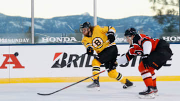 STATELINE, NEVADA - FEBRUARY 21: David Pastrnak #88 of the Boston Bruins shoots the puck past Maksim Sushko #64 of the Philadelphia Flyers during the 'NHL Outdoors At Lake Tahoe' at the Edgewood Tahoe Resort on February 21, 2021 in Stateline, Nevada. The Bruins defeated the Flyers 7-3. (Photo by Christian Petersen/Getty Images)
