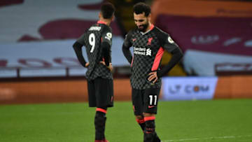 Liverpool, Roberto Firmino, Mohamed Salah (Photo by RUI VIEIRA/POOL/AFP via Getty Images)