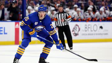 Jan 19, 2023; Buffalo, New York, USA; Buffalo Sabres defenseman Owen Power (25) looks to make a pass during the second period against the New York Islanders at KeyBank Center. Mandatory Credit: Timothy T. Ludwig-USA TODAY Sports