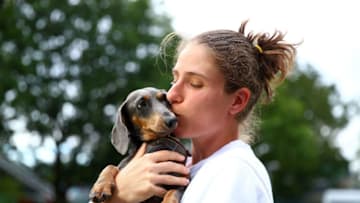 BIRMINGHAM, ENGLAND - JUNE 19: Johanna Konta of Great Britain poses for a photo with her dog Bono during day three of the Nature Valley Classic at Edgbaston Priory Club on June 19, 2019 in Birmingham, United Kingdom. (Photo by Jordan Mansfield/Getty Images for LTA)
