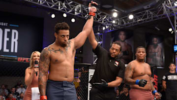 LAS VEGAS, NV - AUGUST 07: Greg Hardy celebrates after his TKO victory over Tebaris Gordon in their heavyweight fight during Dana White's Tuesday Night Contender Series at the TUF Gym on August 7, 2018 in Las Vegas, Nevada. (Photo by Chris Unger/DWTNCS LLC)