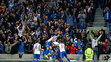 BRIGHTON, ENGLAND - OCTOBER 29: Brighton's Lewis Dunk celebrates with team mates after scoring the teams third goal during the Sky Bet Championship match between Brighton