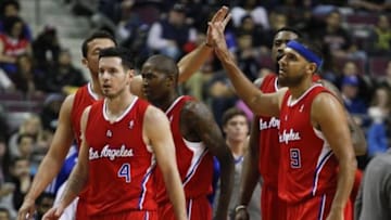 Jan 20, 2014; Auburn Hills, MI, USA; Los Angeles Clippers shooting guard J.J. Redick (4) shooting guard Jamal Crawford (middle) small forward Jared Dudley (9) center DeAndre Jordan (back right) and small forward Hedo Turkoglu (back left) celebrate during the fourth quarter against the Detroit Pistons at The Palace of Auburn Hills. Clippers beat the Pistons 112-103. Mandatory Credit: Raj Mehta-USA TODAY Sports