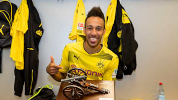 DORTMUND, GERMANY - MAI 20: Pierre-Emerick Aubameyang of Borussia Dortmund celebrates getting the trophy for being the top scorer of this season after the final whistle during the Bundesliga match between Borussia Dortmund and Werder Bremen at Signal Iduna Park on Mai 20, 2017 in Dortmund, Germany. (Photo by Alexandre Simoes/Borussia Dortmund/Getty Images)