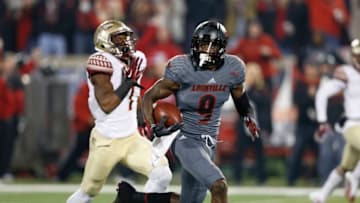 LOUISVILLE, KY - OCTOBER 30: DeVante Parker #9 of the Louisville football program makes a 71-yard reception against the Florida State Seminoles during the game at Papa John's Cardinal Stadium on October 30, 2014 in Louisville, Kentucky. Florida State defeated Louisville 42-31. (Photo by Joe Robbins/Getty Images)