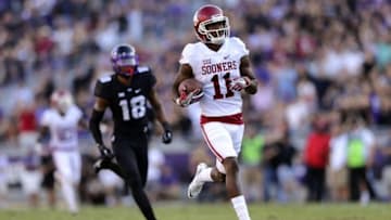 Oct 1, 2016; Fort Worth, TX, USA; Oklahoma Sooners wide receiver Dede Westbrook (11) catches a touchdown pass past TCU Horned Frogs safety Nick Orr (18) during the first half at Amon G. Carter Stadium. Mandatory Credit: Kevin Jairaj-USA TODAY Sports