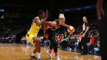 WASHINGTON, DC - AUGUST 9: Elena Delle Donne #11 of the Washington Mystics handles the ball against the Seattle Storm during a game played on August 9, 2018 at the Capital One Arena in Washington, DC. NOTE TO USER: User expressly acknowledges and agrees that, by downloading and or using this photograph, User is consenting to the terms and conditions of the Getty Images License Agreement. Mandatory Copyright Notice: Copyright 2018 NBAE (Photo by Ned Dishman/NBAE via Getty Images)