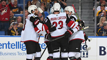 BUFFALO, NY - OCTOBER 28: Conor Garland #83 of the Arizona Coyotes celebrates his first period goal with teammates during an NHL game against the Buffalo Sabres on October 28, 2019 at KeyBank Center in Buffalo, New York. (Photo by Joe Hrycych/NHLI via Getty Images)