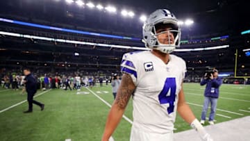 ARLINGTON, TX - DECEMBER 24: Dak Prescott #4 of the Dallas Cowboys walks off the field after the Seattle Seahawks beat the Dallas Cowboys 21-12 at AT&T Stadium on December 24, 2017 in Arlington, Texas. (Photo by Tom Pennington/Getty Images)