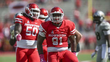 Oct 29, 2016; Houston, TX, USA; Houston Cougars defensive end Nick Thurman (91) celebrates after a defensive play during the fourth quarter against the Central Florida Knights at TDECU Stadium. The Cougars won 31-24. Mandatory Credit: Troy Taormina-USA TODAY Sports