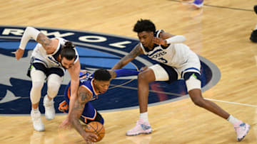 MINNEAPOLIS, MINNESOTA - MARCH 31: Ricky Rubio #9 and Jaden McDaniels #3 of the Minnesota Timberwolves double team Elfrid Payton #6 of the New York Knicks during the first quarter of the game at Target Center on March 31, 2021 in Minneapolis, Minnesota. NOTE TO USER: User expressly acknowledges and agrees that, by downloading and or using this Photograph, user is consenting to the terms and conditions of the Getty Images License Agreement (Photo by Hannah Foslien/Getty Images)