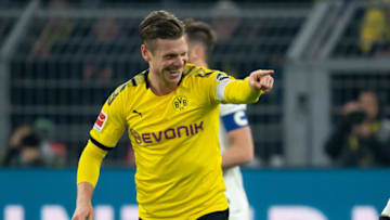 DORTMUND, GERMANY - FEBRUARY 14: (BILD ZEITUNG OUT) Lukasz Piszczek of Borussia Dortmund celebrates after scoring his team's first goal during the Bundesliga match between Borussia Dortmund and Eintracht Frankfurt at Signal Iduna Park on February 14, 2020 in Dortmund, Germany. (Photo by DeFodi Images via Getty Images)