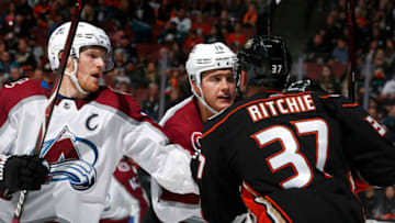ANAHEIM, CA - NOVEMBER 18: Gabriel Landeskog #92 and Nikita Zadorov #16 of the Colorado Avalanche battle against Nick Ritchie #37 of the Anaheim Ducks during the game on November 18, 2018 at Honda Center in Anaheim, California. (Photo by Debora Robinson/NHLI via Getty Images)