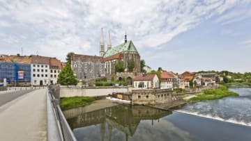 GOERLITZ, GERMANY- JUNE 04: View across the Altstadtbruecke and the Neisse river to the Vierradenmuehle and the Peterskirche on June 04, 2021 in Goerlitz, Germany. (Photo by Frank Hoensch/Getty Images)
