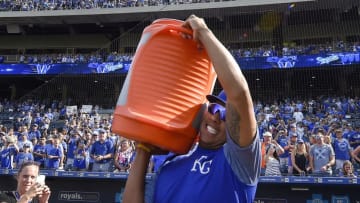 Kansas City Royals' Salvador Perez carries out the water cooler to deliver the Salvy Splash to Alex Gordon after the team's 11-3 win over the Minnesota Twins on Sunday, Sept. 10, 2017 at Kauffman Stadium in Kansas City, Mo. (John Sleezer/Kansas City Star/TNS via Getty Images)