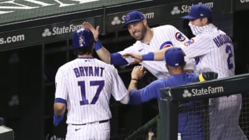 Sep 15, 2020; Chicago, Illinois, USA; Chicago Cubs third baseman Kris Bryant (17) celebrates with teammates after scoring against the Cleveland Indians during the fifth inning at Wrigley Field. Mandatory Credit: Kamil Krzaczynski-USA TODAY Sports