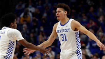 Kentucky’s Kellan Grady celebrates with teammate Sahvir Wheeler after scoring against Miles College.Nov. 5, 2021Kentucky Miles 13