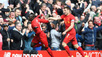 LIVERPOOL, ENGLAND - APRIL 01: Sadio Mane of Liverpool (L) celebrates scoring his sides first goal with James Milner of Liverpool (R) during the Premier League match between Liverpool and Everton at Anfield on April 1, 2017 in Liverpool, England. (Photo by Gareth Copley/Getty Images)