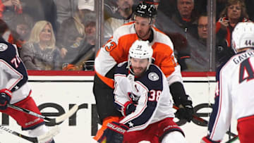 PHILADELPHIA, PENNSYLVANIA - FEBRUARY 18: Boone Jenner #38 of the Columbus Blue Jackets gets off a first period shot against the Philadelphia Flyers at the Wells Fargo Center on February 18, 2020 in Philadelphia, Pennsylvania. (Photo by Bruce Bennett/Getty Images)