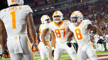 Tennessee running back Tiyon Evans (8) and Tennessee tight end Jacob Warren (87) celebrate a touchdown by Tennessee wide receiver Velus Jones Jr. (1) during a football game between the Tennessee Volunteers and the Alabama Crimson Tide at Bryant-Denny Stadium in Tuscaloosa, Ala., on Saturday, Oct. 23, 2021.Kns Tennessee Alabama Football Bp