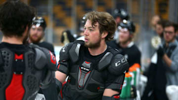 BOSTON - MAY 25: Boston Bruins Charlie McAvoy switches jerseys during Boston Bruins practice in preparation for Game 1 of the Stanley Cup Finals against the St. Louis Blues at TD Garden in Boston on May 25, 2019. (Photo by John Tlumacki/The Boston Globe via Getty Images)