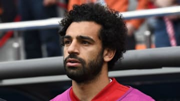 TOPSHOT - Egypt's forward Mohamed Salah is seen by the substitutes bench before kick off of the Russia 2018 World Cup Group A football match between Egypt and Uruguay at the Ekaterinburg Arena in Ekaterinburg on June 15, 2018. (Photo by Anne-Christine POUJOULAT / AFP) / RESTRICTED TO EDITORIAL USE - NO MOBILE PUSH ALERTS/DOWNLOADS (Photo credit should read ANNE-CHRISTINE POUJOULAT/AFP/Getty Images)