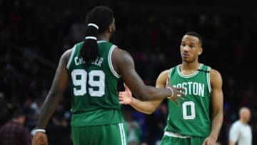 Dec 26, 2015; Auburn Hills, MI, USA; Boston Celtics guard Avery Bradley (0) high fives forward Jae Crowder (99) during the fourth quarter against the Detroit Pistons at The Palace of Auburn Hills. Mandatory Credit: Tim Fuller-USA TODAY Sports
