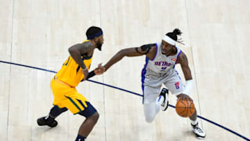 Jerami Grant #9 of the Detroit Pistons drives against Royce O'Neale #23 of the Utah Jazz (Photo by Alex Goodlett/Getty Images)