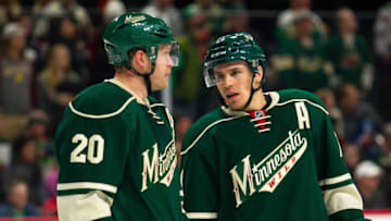 ST. PAUL, MN - DECEMBER 11: Ryan Suter #20 and Zach Parise #11 of the Minnesota Wild before the faceoff during the Central Division match up between the St. Louis Blues and the Minnesota Wild on December 11, 2016, at Xcel Energy Center in St. Paul, Minnesota. The Wild won 3-1. (Photo by David Berding/Icon Sportswire via Getty Images)