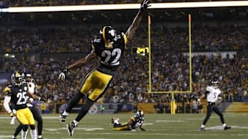 Jan 3, 2015; Pittsburgh, PA, USA; Pittsburgh Steelers cornerback William Gay (22) defends a pass by Baltimore Ravens quarterback Joe Flacco (5) in the second quarter in the 2014 AFC Wild Card playoff football game at Heinz Field. Mandatory Credit: Geoff Burke-USA TODAY Sports