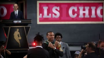 NEW YORK, USA - JUNE 21: Wendell Carter Jr. (C) reacts after being drafted seventh overall by the Chicago Bulls during the 2018 NBA Draft in Barclays Center in New York, United States on June 21, 2018. (Photo by Mohammed Elshamy/Anadolu Agency/Getty Images)