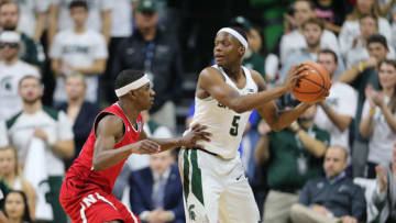 EAST LANSING, MI - DECEMBER 3: Cassius Winston #5 of the Michigan State Spartans handles the ball against Glynn Watson Jr. #5 of the Nebraska Cornhuskers at Breslin Center on December 3, 2017 in East Lansing, Michigan. (Photo by Rey Del Rio/Getty Images)