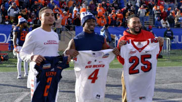 ALBUQUERQUE, NM - DECEMBER 17: UTSA Roadrunners RB Jarveon Williams (2) and New Mexico Lobos RB Romell Jordan (4) exchange jerseys following the Gildan New Mexico Bowl between the New Mexico Lobos and the UTSA Roadrunners on December 17, 2016, at University Stadium in Albuquerque, New Mexico. (Photo by Allan Dranberg/Icon Sportswire via Getty Images)