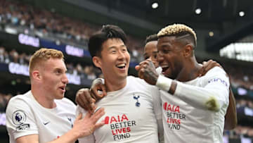 Tottenham Hotspur's South Korean striker Son Heung-Min (C) celebrates after scoring his team third goal during the English Premier League football match between Tottenham Hotspur and Leicester City at Tottenham Hotspur Stadium in London, on May 1, 2022. - - RESTRICTED TO EDITORIAL USE. No use with unauthorized audio, video, data, fixture lists, club/league logos or 'live' services. Online in-match use limited to 120 images. An additional 40 images may be used in extra time. No video emulation. Social media in-match use limited to 120 images. An additional 40 images may be used in extra time. No use in betting publications, games or single club/league/player publications. (Photo by Glyn KIRK / AFP) / RESTRICTED TO EDITORIAL USE. No use with unauthorized audio, video, data, fixture lists, club/league logos or 'live' services. Online in-match use limited to 120 images. An additional 40 images may be used in extra time. No video emulation. Social media in-match use limited to 120 images. An additional 40 images may be used in extra time. No use in betting publications, games or single club/league/player publications. / RESTRICTED TO EDITORIAL USE. No use with unauthorized audio, video, data, fixture lists, club/league logos or 'live' services. Online in-match use limited to 120 images. An additional 40 images may be used in extra time. No video emulation. Social media in-match use limited to 120 images. An additional 40 images may be used in extra time. No use in betting publications, games or single club/league/player publications. (Photo by GLYN KIRK/AFP via Getty Images)