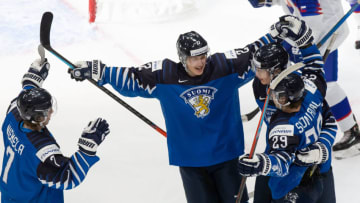 EDMONTON, AB - DECEMBER 30: Topi Niemela #7, Roni Hirvonen #22, Anton Lundell #15 and Kasper Simontaival #29 of Finland celebrate a goal against Slovakia during the 2021 IIHF World Junior Championship at Rogers Place on December 30, 2020 in Edmonton, Canada. (Photo by Codie McLachlan/Getty Images)