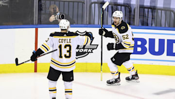 Boston Bruins, Sean Kuraly #52, Charlie Coyle #13 (Photo by Elsa/Getty Images)