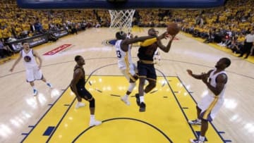 Jun 7, 2015; Oakland, CA, USA; Cleveland Cavaliers forward LeBron James (23) is fouled by Golden State Warriors forward Draymond Green (23) in game two of the NBA Finals at Oracle Arena. Mandatory Credit: Ezra Shaw-Pool Photo via USA TODAY Sports
