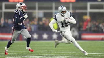 Nov 24, 2019; Foxborough, MA, USA; Dallas Cowboys wide receiver Amari Cooper (19) runs the ball past New England Patriots cornerback Stephon Gilmore (24) during the second half at Gillette Stadium. Mandatory Credit: Bob DeChiara-USA TODAY Sports