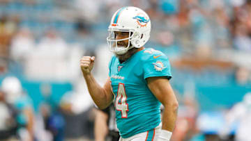 MIAMI, FLORIDA - DECEMBER 22: Ryan Fitzpatrick #14 of the Miami Dolphins reacts against the Cincinnati Bengals during the fourth quarter at Hard Rock Stadium on December 22, 2019 in Miami, Florida. (Photo by Michael Reaves/Getty Images)