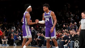 NEW YORK, NY - MARCH 9: De'Aaron Fox #5 and Buddy Hield #24 of the Sacramento Kings shake hands during the game against the New York Knicks on March 9, 2019 at Madison Square Garden in New York City, New York. NOTE TO USER: User expressly acknowledges and agrees that, by downloading and/or using this photograph, user is consenting to the terms and conditions of the Getty Images License Agreement. Mandatory Copyright Notice: Copyright 2019 NBAE (Photo by Nathaniel S. Butler/NBAE via Getty Images)