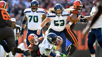 CLEVELAND, OHIO - OCTOBER 13: Myles Garrett #95 of the Cleveland Browns sacks Russell Wilson #3 of the Seattle Seahawks during the first quarter at FirstEnergy Stadium on October 13, 2019 in Cleveland, Ohio. (Photo by Jason Miller/Getty Images)