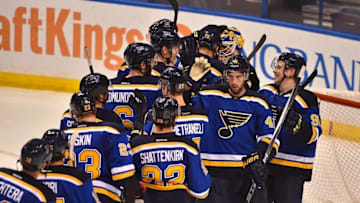 Mar 25, 2016; St. Louis, MO, USA; The St. Louis Blues players celebrate after defeating the Vancouver Canucks 4-0 at Scottrade Center. Mandatory Credit: Jasen Vinlove-USA TODAY Sports