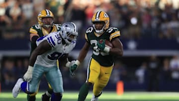 ARLINGTON, TX - OCTOBER 08: Aaron Jones #33 of the Green Bay Packers runs the ball against the Dallas Cowboys in the fourth quarter at AT&T Stadium on October 8, 2017 in Arlington, Texas. (Photo by Ronald Martinez/Getty Images)