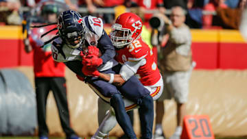 KANSAS CITY, MO - OCTOBER 13: Tyrann Mathieu #32 of the Kansas City Chiefs tackles DeAndre Hopkins #10 of the Houston Texans during the third quarter at Arrowhead Stadium on October 13, 2019 in Kansas City, Missouri. (Photo by David Eulitt/Getty Images)