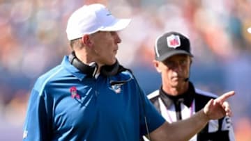 Oct 12, 2014; Miami Gardens, FL, USA; Miami Dolphins head coach Joe Philbin complains to the referee in the second half of the game at Sun Life Stadium. Green Bay defeated Miami 27-24. Mandatory Credit: Brad Barr-USA TODAY Sports