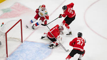 EDMONTON, AB - JANUARY 04: Kaiden Guhle #21, goaltender Devon Levi #1 and Justin Barron #27 of Canada defend against Yegor Chinakhov #21 of Russia during the 2021 IIHF World Junior Championship semifinals at Rogers Place on January 4, 2021 in Edmonton, Canada. (Photo by Codie McLachlan/Getty Images)