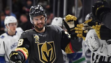 LAS VEGAS, NV - FEBRUARY 23: Tomas Hyka #38 of the Vegas Golden Knights celebrates with teammates on the bench after he scored his first career NHL goal during the first period of a game against the Vancouver Canucks at T-Mobile Arena on February 23, 2018 in Las Vegas, Nevada. The Golden Knights won 6-3. (Photo by Ethan Miller/Getty Images)