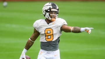 Running back Tiyon Evans (8) points on the field at an open University of Tennessee spring football practice at Neyland Stadium, Saturday, April 10, 2021.Utpractice0410 0413