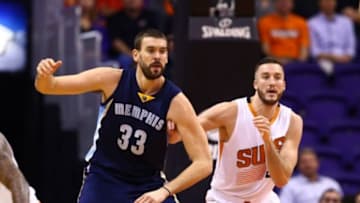 Nov 5, 2014; Phoenix, AZ, USA; Memphis Grizzlies center Marc Gasol (33) against Phoenix Suns center Miles Plumlee (22) at US Airways Center. The Grizzlies defeated the Suns 102-91. Mandatory Credit: Mark J. Rebilas-USA TODAY Sports